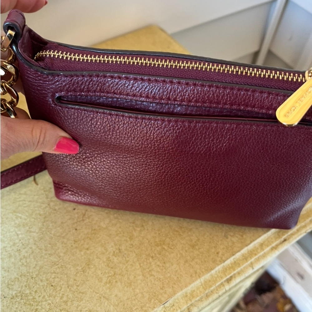 Michael Kors Dark Red Crossbody Bag with secure closure and lots of compartments - Picture 7 of 14